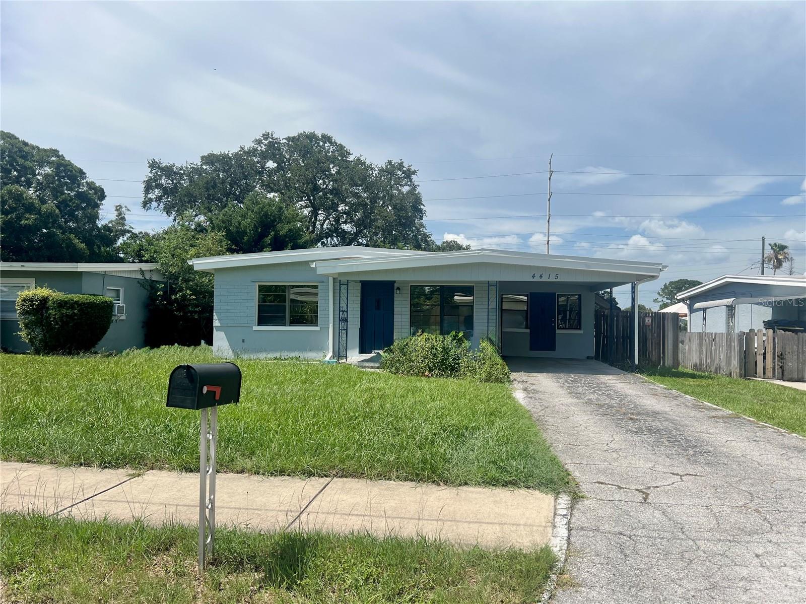 Nice 2/1/1 with fresh paint inside & out. The living room & bedrooms have vaulted ceilings & there is a bonus room off the kitchen that would make a nice office or breakfast area. Tile floors throughout, updated bathroom & interior laundry room (tenant must provide washer & dryer). Outside there is a one car carport in the front plus a big yard & sidewalks for the kiddos to ride bikes. In the back the yard is fenced & there is a screened porch, a second carport & a double gate that leads to the alley. This is a nice set up if you own a boat or a trailer that you need a place to park. Well behaved pets considered, no aggressive dog breeds no exotic animals. There is a $200 pet fee per pet. Move in requirements: $100 credit & background fee per adult. 590 or higher credit score & a monthly household income of at least $6000 / month.