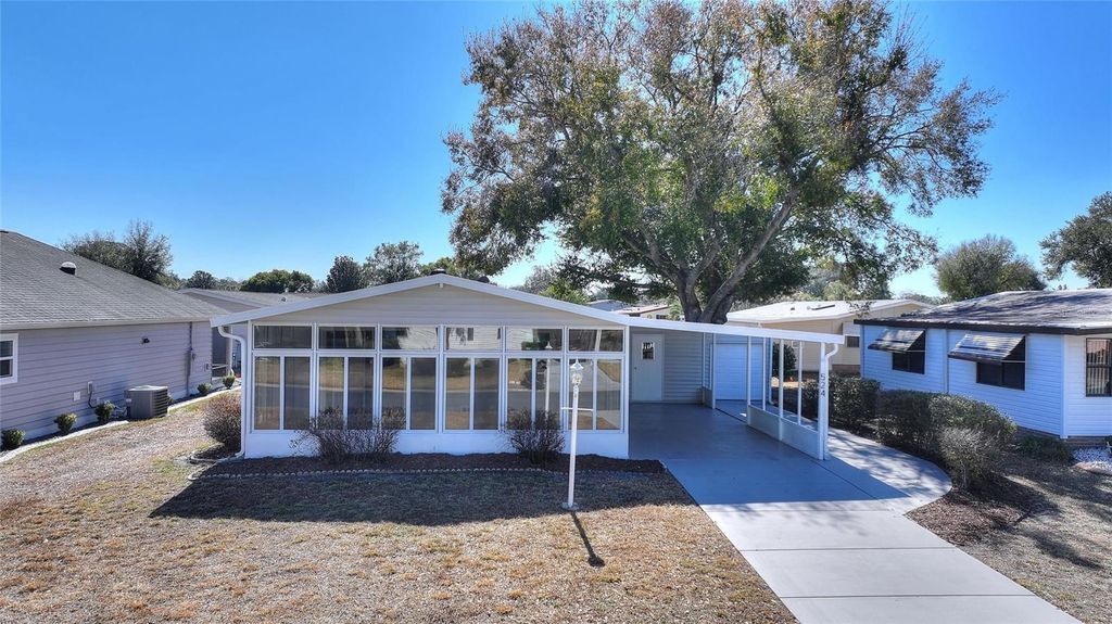 Photo of 524 Bonita Drive, Lady Lake, FL 32159 (MLS # A4683423)