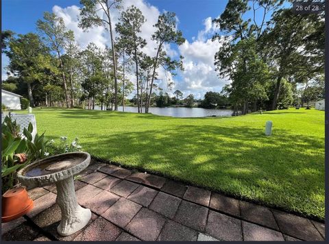 Photo of 22 Kings Colony Court, Palm Coast, FL 32137 (MLS # FC313202)