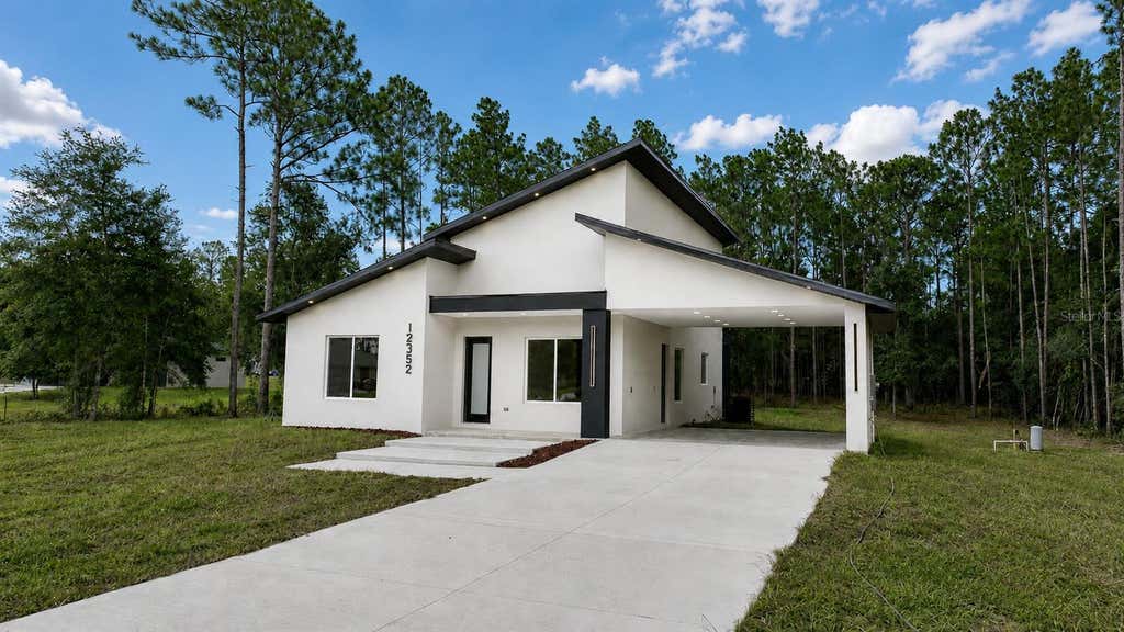 Photo of 12352 SW 61st Place Road, Ocala, FL 34481 (MLS # O6435713)