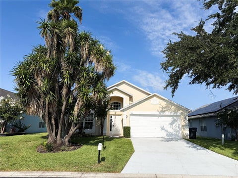 Photo of 207 Langham Drive, Davenport, FL 33897 (MLS # TB8540952)