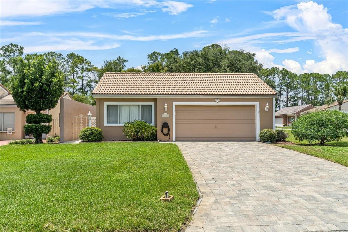 Meticulously Maintained 3 Bedroom, 2 Bath Home on a Corner 0.25 Acre Wooded Lot in Desirable SE Winter Haven – No Age Restrictions & No Required HOA! New A/C in 2024, tile roof with 10+ years of remaining life, re-plumbed with pex throughout and water heater is 7 years old.
Welcome to 111 Las Flores, step inside and you'll find a generous family room ideal for relaxing and gathering, a formal living room with soaring ceilings that create an open and airy feel, and a formal dining room complete with built-in cabinetry—perfect for elegant dinners or holiday celebrations. The remodeled kitchen features rich hardwood cabinetry, stunning granite countertops, a custom tiled backsplash, convenient breakfast bar, stainless steel appliances including a natural gas range, and a closet pantry for ample storage. The large primary suite offers direct access to the family room and features a remodeled en-suite bathroom with a sleek modern vanity and a stylish tiled walk-in shower. A split-bedroom layout provides privacy, with the second bedroom and full guest bath—also featuring a walk-in shower—nicely separated from the primary. The third bedroom, currently used as an office, includes French doors and a walk-in closet, making it a flexible option for guests or additional living space.
Outdoor living is equally impressive, with a screen-enclosed lanai that includes a built-in counter and cabinetry, ideal for storage or serving. A beautiful paver driveway leads to the attached two-car garage, while a private walkway wraps around to the back of the home, unveiling a large paver patio overlooking a serene wooded backdrop. Whether you're enjoying your morning coffee or hosting a weekend BBQ, this peaceful outdoor setting is sure to become a favorite retreat.
Additional features include; new exterior paint, the new 2024 A/C system comes with a warranty, a laundry space in the garage that comes equipped with a washer and dryer, storage cabinetry in the garage, rain gutters, an irrigation system, and more. A furnishings package is also available, as a separate purchase.
Residents of Orchid Springs enjoy the option to join the community HOA for just $60 per year, while a modest monthly fee of $101.50 covers lawn care and access to the community pool and clubhouse. With no age restrictions and no mandatory HOA, this neighborhood provides rare flexibility in a peaceful, well-manicured setting.
Ideally located in SE Winter Haven, this home offers convenient access to Legoland Florida, schools, medical facilities, shopping, dining, and is perfectly situated between Tampa and Orlando as well as Florida’s east and west coast beaches.
Don’t miss the opportunity to own this move-in ready home in one of Winter Haven’s most charming and established communities!