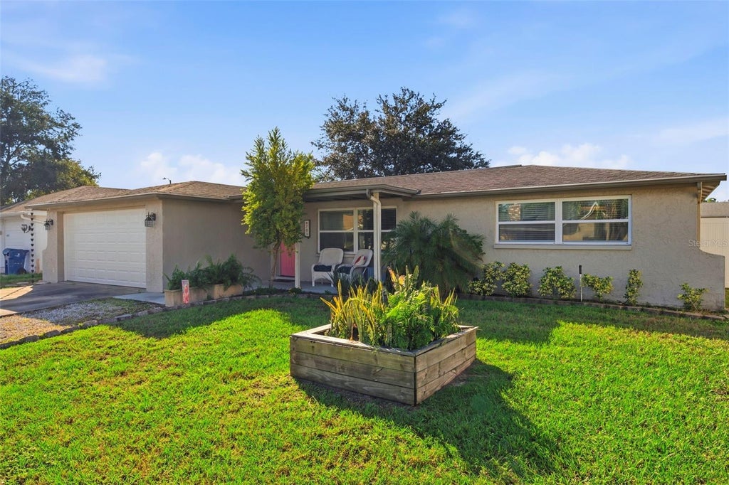Photo of 6703 Ranchwood Loop, New Port Richey, FL 34653 (MLS # W7890535)
