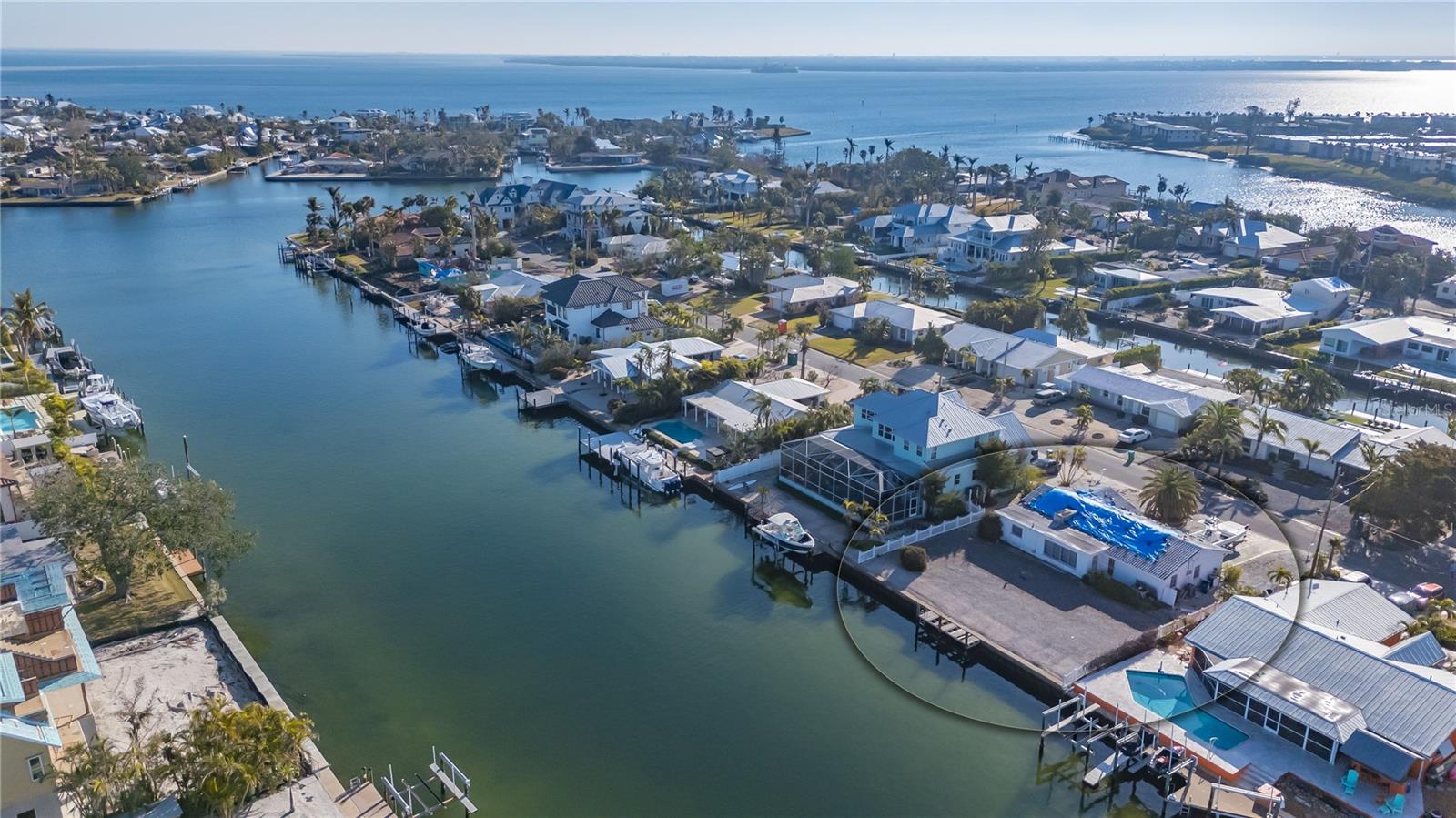 Located on the Grand Canal in Holmes Beach on Anna Maria Island, this property offers an unparalleled opportunity for waterfront living. The canal is the largest on the island, providing expansive views and direct access to the water, making it a perfect spot for fishing, boating, and enjoying the natural beauty of the area.
The home was damaged by hurricanes in 2024, and as a result, the property is now being sold as-is, with the possibility of a full renovation or demolition to make way for a new, custom-built residence. Whether you're interested in restoring the existing home or designing a spectacular, brand-new estate, this prime location offers limitless potential.
The lot boasts a generous size and the kind of waterfront views that are rare to find, especially in such a desirable location. You’ll be just moments from the best that Anna Maria Island, pristine beaches, top-notch dining, boutique shops, and a vibrant, laid-back island lifestyle.
If you're looking for a property where you can create your dream home, this is an exceptional opportunity to build a luxurious waterfront estate in one of Florida’s most sought-after locations. The possibilities are endless with this piece of paradise, so don’t miss out on the chance to make it yours.