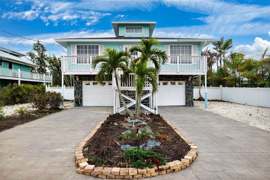 Experience the ultimate coastal retreat at 311 Poinsettia Rd in Anna Maria, FL—a home where luxury meets laid-back island living. This beautifully renovated, elevated sanctuary boasts stunning waterfront views, a sparkling pool, and your very own private boat dock with a lift, inviting endless adventures on the water. Enjoy the convenience of RV/boat parking and a generous driveway that sets the stage for memorable gatherings. Just a leisurely stroll to pristine beaches and a quick golf cart ride to lively restaurants and bars, every moment here is infused with warmth, charm, and the promise of a vibrant lifestyle. Welcome home to your dream coastal haven. This property is currently used as a NIGHTLY rental bringing in up to $25,000/month so far this year. Please do not disturb the guests.