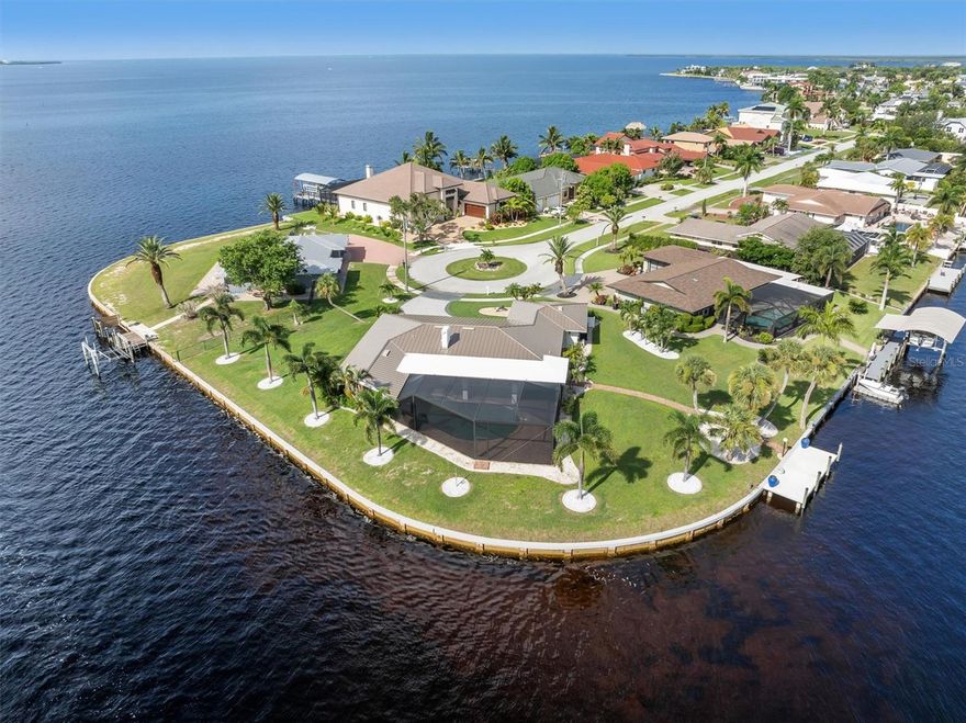 LOCATION is everything • Come see this Rare Opportunity on The POINT on Charlotte Harbor • With 261 Feet of Sea Wall Fronatge • This home has it ALL • Spectacular Views ! • Instant Sailboat / Boat access to the Harbor • Look out & Enjoy the Harbor, Sunseekers Resort, or Fishermen's Village from the Pool, from the primary bedroom & of course from the Sun Room • Meticulously maintained inside & out • This 1/2 acre lot is in a Cul-de-sac • NO History of FLOODING • Fabulous Custom Kitchen new in 2021 • New standing seam metal roof 2024 • Kitchen featutres Cambria Quartz & High end appliances • Including built in Convection oven & microwave • Full length Picture Frame cage screen to enhance you already Awesome Views • Oversized Salt Water heated Pool • Enormous screened in Lanai • 5 double doors with glass all leading to the Lanai • Freshly painted exterior • Sun Room is spacious & offers breathtaking views • Beautifully & Professionally landscaped • New cement 28 x 10 Dock in 2024 • Ceramic tiles throughout home - carpet is only in the 3 bedrooms • Just cross the bridge and you are enjoying all that downtown Punta Gorda has - Parks - 5 Star eateries - Live music every evening, the list goes on & on • Welcome to 374 Severin Rd on Charlotte Harbor • Get all the details at https://funkypalmproductions.hd.pics/374-Severin-Rd-SE/idx