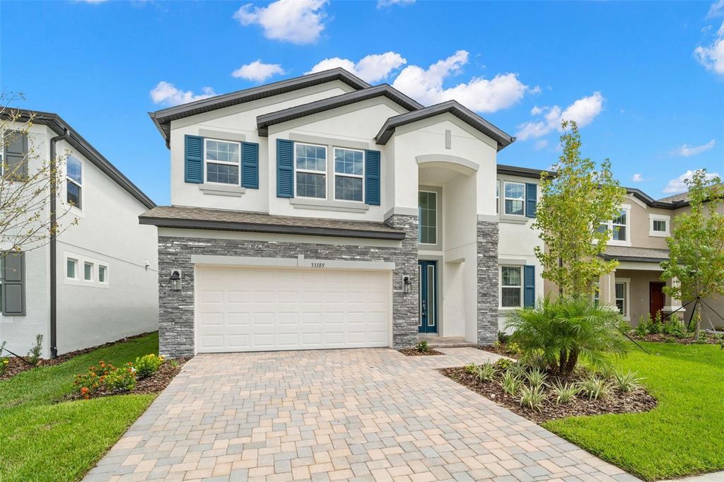 Photo of 33189 ROSEWOOD BARK WAY, WESLEY CHAPEL, FL 33545 (MLS # T3463497)