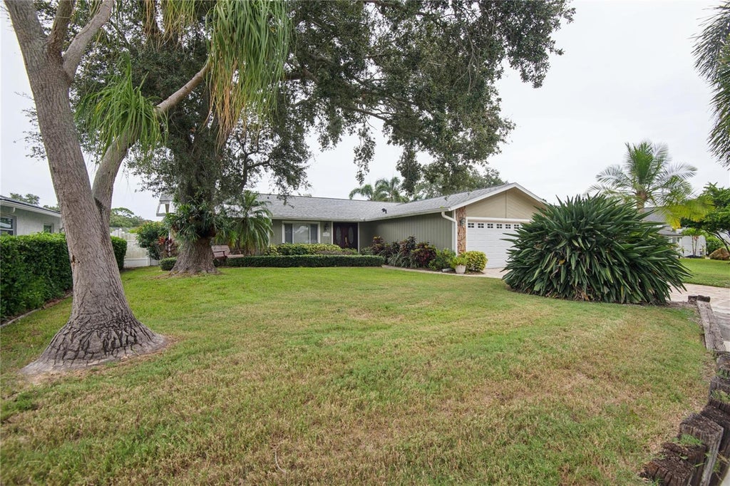 Photo of 13511 Rustic Pines Boulevard S, Seminole, FL 33776 (MLS # O6448733)