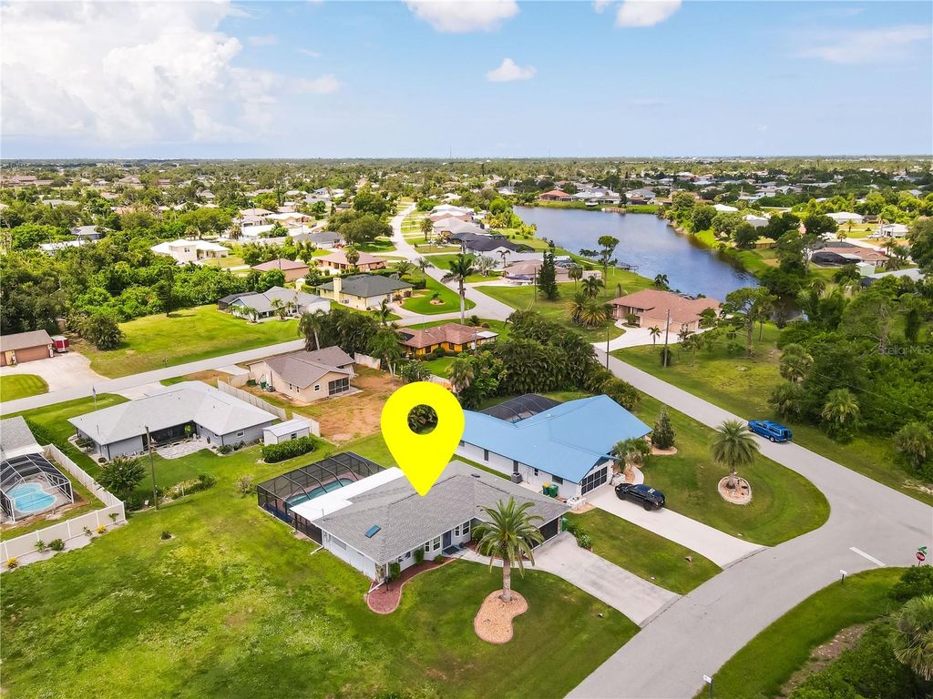 Photo of 10141 Asbury Avenue, Englewood, FL 34224 (MLS # C7512723)