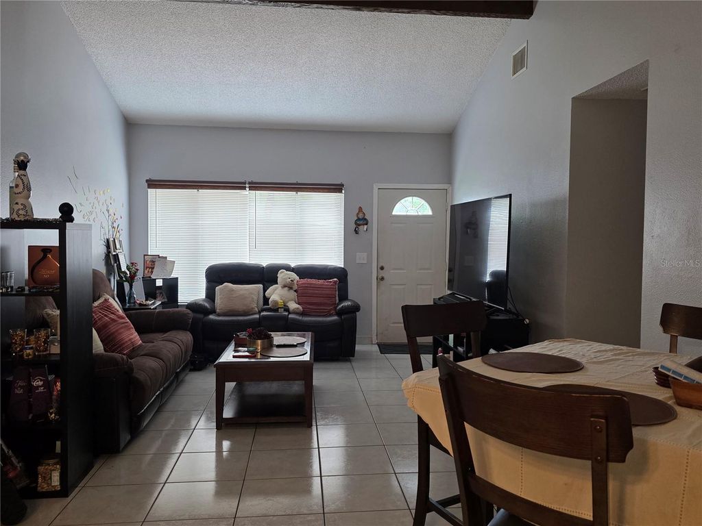 Photo of 2821 Charing Cross Way, Orlando, FL 32837 (MLS # TB8502607)