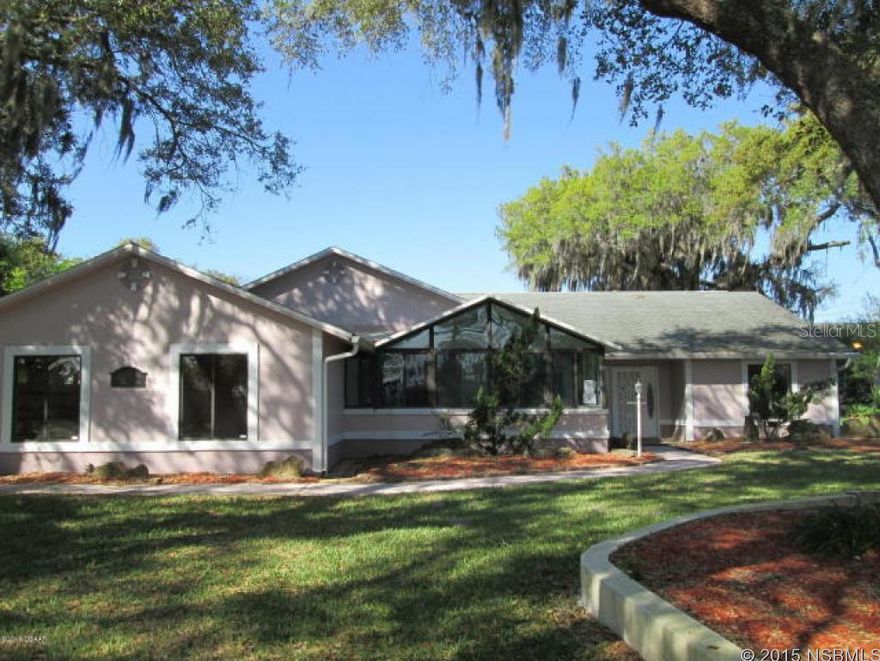 Riverview home located on beautiful Riverside Dr. with a large lot.