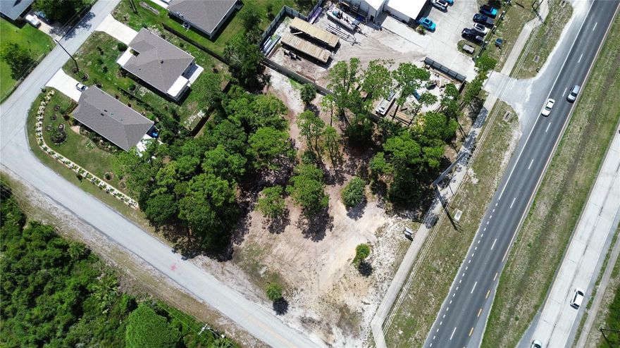 Prime Commercial Property with Exceptional Business Opportunity! Unlock the potential of this strategically located commercial property situated on a corner lot at the intersection of South Ridgewood Avenue and Godfrey Road. Boasting 200 feet of highly visible highway frontage along bustling S Ridgewood Ave, this site is zoned B3 – Commercial Highway, offering a wide array of potential development uses.
Whether you're looking to establish a retail center, office complex, restaurant, or service-based business, this location provides maximum exposure and convenient access in a high-traffic area. The corner lot configuration enhances accessibility and offers excellent ingress and egress options for future customers or clients. An added bonus: The seller states that all impact fees have already been paid, potentially saving thousands in upfront development costs and reducing your time to build. With flexible zoning, a prime location, and essential fees already covered, this property is a rare opportunity for savvy investors or business owners seeking a standout location with high commercial potential.