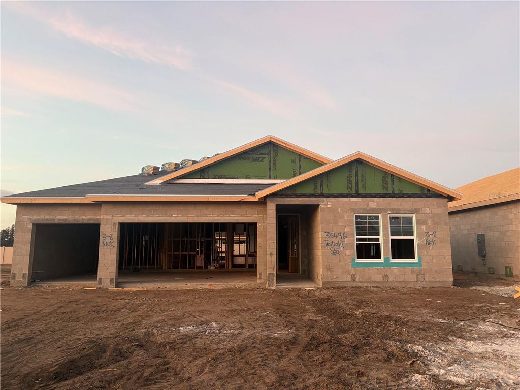 Photo of 33496 Twilight Sea Place, Wesley Chapel, FL 33545 (MLS # TB8476923)