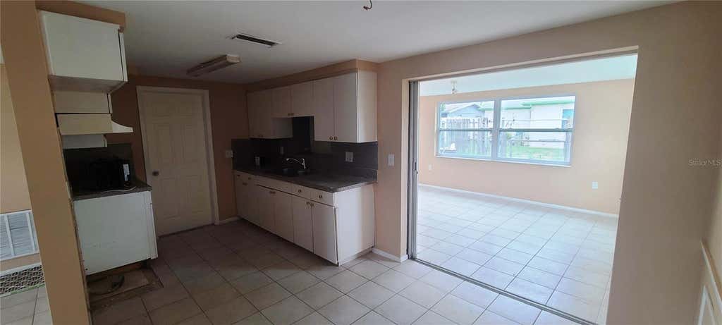 Photo of 5305 Hawk Drive, Holiday, FL 34690 (MLS # TB8521053)
