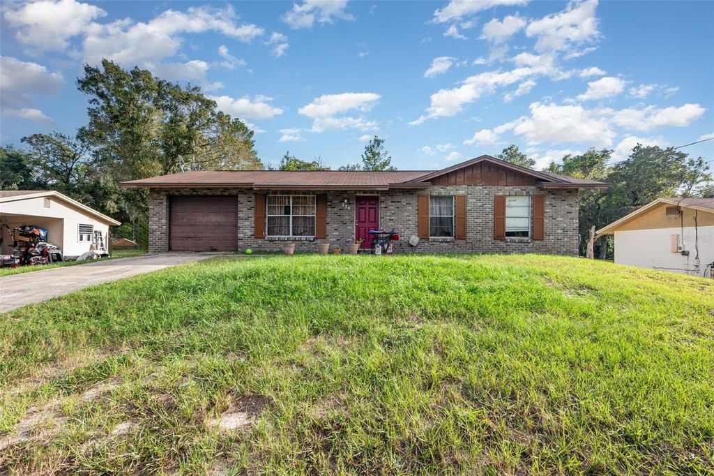 Photo of 320 W Ohio Avenue, Orange City, FL 32763 (MLS # TB8439665)