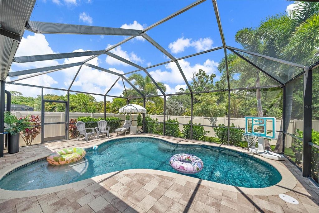 Photo of 4857 Silver Topaz Street, Sarasota, FL 34233 (MLS # A4693542)