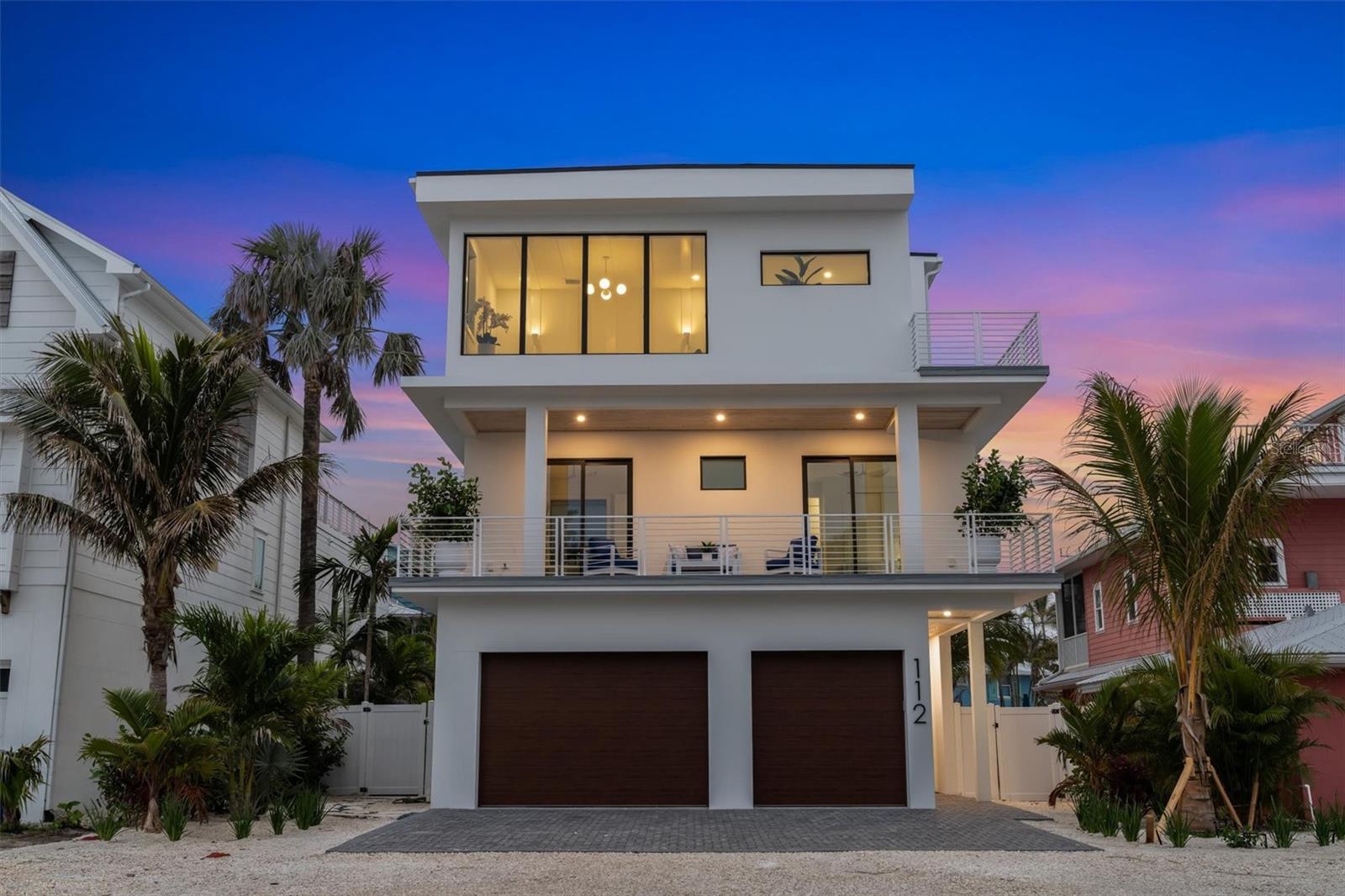 Welcome to Casa Blue Curacao, a stunning custom-built retreat in the heart of Anna Maria Island and 2 houses away from the Gulf beach!!! This exquisite 4-bedroom, 4.5-bathroom home offers luxury and functional in equal measure, designed in all shades of blue and for those who crave both relaxation and sophistication. Spanning multiple levels, the residence boasts an open-concept layout with high-end finishes, ample natural light, and seamless indoor-outdoor living. Each of the four spacious bedrooms provides a private sanctuary, complete with en-suite bathrooms for ultimate comfort and convenience. The additional half bath is perfectly positioned for guests. The true showstopper, however, lies above—two expansive rooftop decks offering breathtaking views of the Gulf of Mexico beaches. Whether you’re sipping morning coffee in one of the hanging swings or watching stunning sunsets and playing pool in the evening, these elevated spaces elevate every moment. The backyard features a stylish heated pool and spa that is covered, enjoy the low maintenance turf, TV, ping pong, corn hole, fire pits and more! In addition, there is a fun hang out/seating area right off the pool with a TV! Nestled in the coveted Anna Maria community, this home is just steps from the sugar-sand beaches, charming shops and local dining on Pine Ave. Casa Blue Curacao is more than a home—it’s a lifestyle. Your island dream awaits.