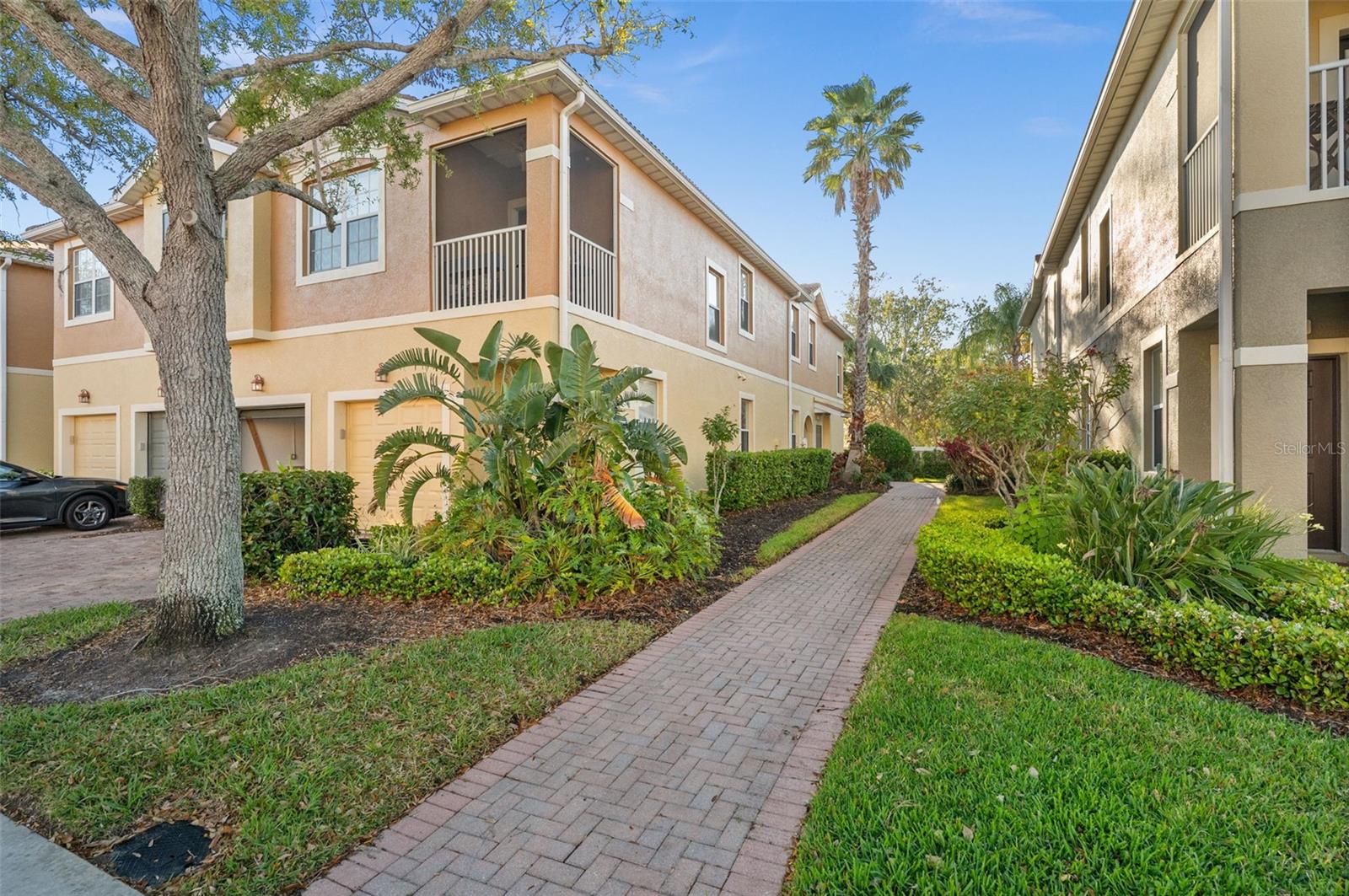 Beautiful, rarely available ground floor unit in Stonehaven! ONE OF THE HIGHEST ELEVATION AREA IN SARASOTA ! This move-in ready condo has 3 bedrooms, 2 bathrooms and a 1 car garage. The unit is very quiet and peaceful. It is kept in perfect condition by the owners that are here only a few times during the year. The nice sized master en-suite includes spacious closets, a large step in shower, and a linen closet. Beyond the kitchen through the hallway are two guest bedrooms, a closet where the washer and dryer are located, as well as a second full bathroom including a combo tub & shower. The attached one car garage has a paver driveway. Interior freshly painted, neutral tile throughout the living areas and new carpet in the bedrooms. Appliances are newer throughout. The unit features concrete block construction, hurricane impact windows and sliding doors throughout as well as energy saving LED lighting. A whole unit surge protector has been installed to protect your sensitive electronics and appliances for peace of mind during storms. Stonehaven is a gated community with a resort style heated pool and play ground. Located in Sarasota's "A" rated school district, including Ashton Elementary, Sarasota Middle and Riverview High (w/IB program). The low monthly condo fee covers building & ground maintenance, escrow reserves, amenities & common area maintenance, community management, irrigation, and common area taxes.