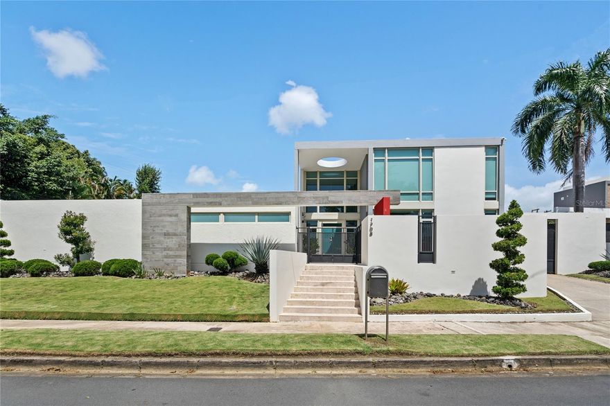 Welcome to this spectacular San Francisco home, located on a sprawling 1500-square-meter flat lot. Designed by the renowned architect Americo Delgado, the house masterfully captures natural light with its stunning glass walls and exposed concrete features. Step inside to be greeted by soaring 20-foot ceilings and a mezzanine that accentuates the airy ambiance. The elegance of the one level home, showcasing marble floors extends throughout the home, leading you to an exquisite Italian kitchen that overlooks a serene pool and terrace. The kitchen boasts Valcor Samcor windows, an island topped with luxurious Calacatta stone seating 10, and state-of-the-art appliances. Outside, enjoy the covered terrace with a pool, perfect for entertaining. The property features an Apple Home intelligent system, effortlessly controlling lighting, entertainment and security with over 16 cameras. A spacious driveway leads to a covered carport for 3 cars, with additional parking for up to 6 vehicles. The beautifully landscaped grounds feature blue agaves, spiral spines, and diamelas, with an automated irrigation system and enchanting night lighting. This home is a perfect blend of luxury, functionality, and architectural brilliance.