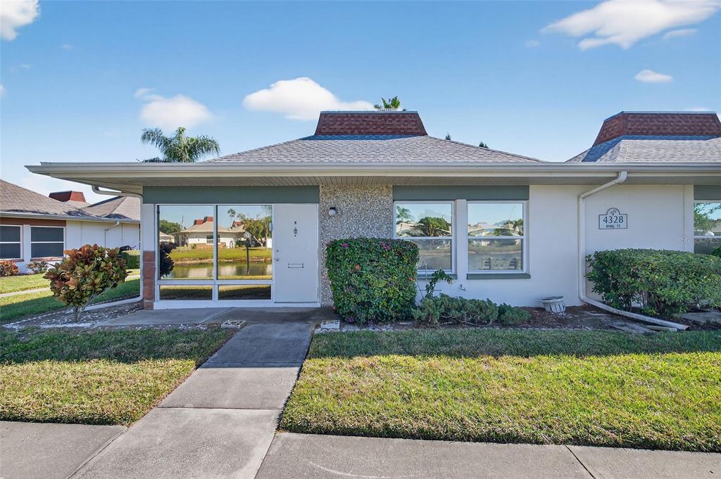 Photo of 4328 Tahitian Gardens Circle #E, Holiday, FL 34691 (MLS # TB8443316)