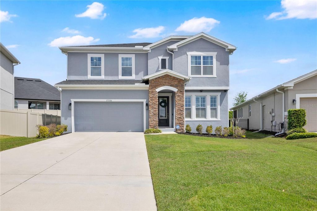 Photo of 17186 Hickory Wind Drive, Clermont, FL 34711 (MLS # O6396522)