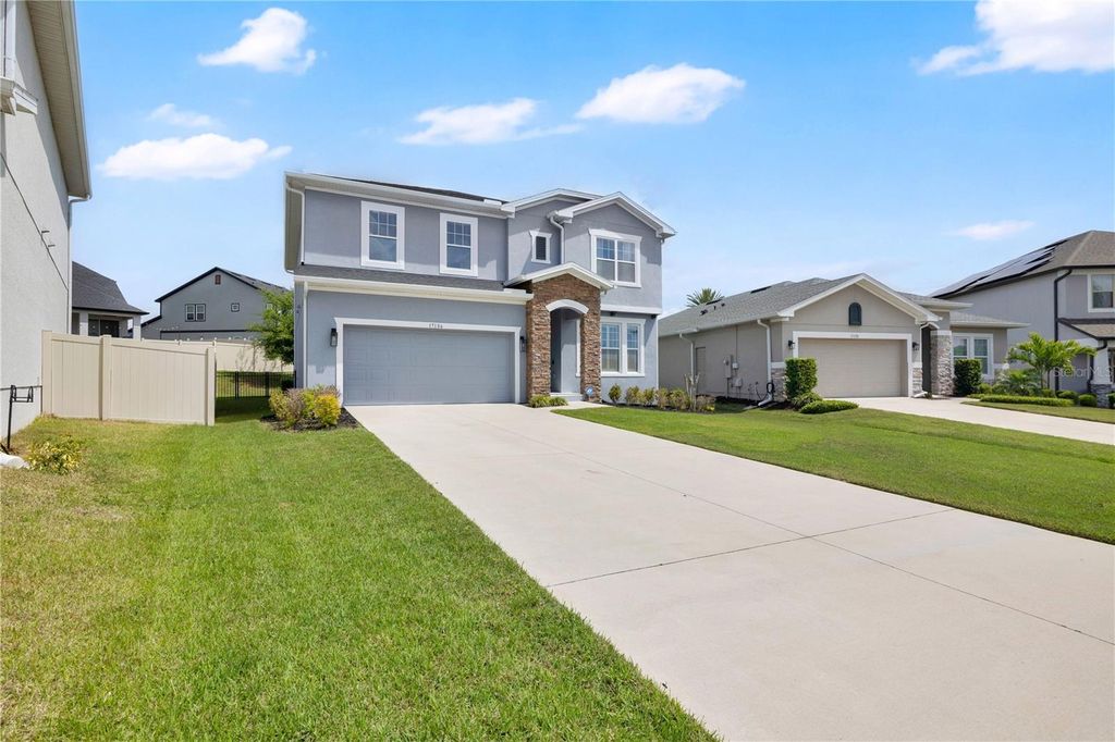 Photo of 17186 Hickory Wind Drive, Clermont, FL 34711 (MLS # O6396522)