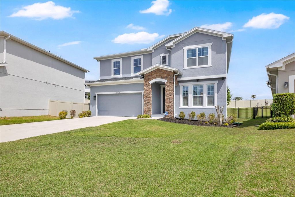 Photo of 17186 Hickory Wind Drive, Clermont, FL 34711 (MLS # O6396522)