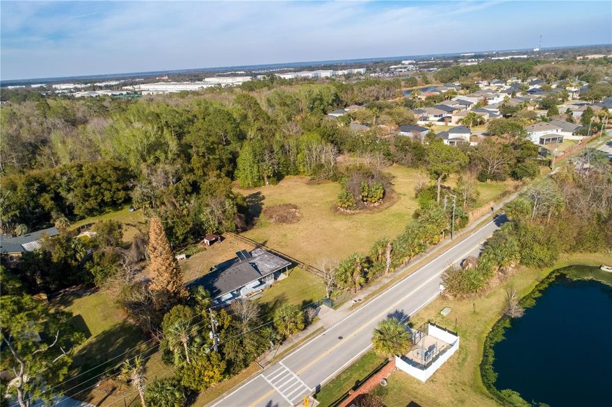 Location, location, location! Rare opportunity to own over five acres and still be in the heart of it all. Come see the serenity of this oasis. Large almost three-acre parcel with the house is mostly cleared and out of the flood zone. Plenty of space to build your dream home or remodel the existing home and enjoy the land. Future land use classification is low-density residential. Another over two-acre parcel in the back with beautiful nature trails. The options are endless. Close to Idyllwilde Elementary School. Seminole county is among the nation's highest quality public school systems. (seminolecountyfl.gov) Located just minutes to I-4, Seminole Towne Center Mall, Lake Monroe, and downtown Sanford with all the quaint shops and excellent dining options. This location is an easy commute to Orlando and only 45 minutes to some of the most beautiful beaches in the area! The existing three-bedroom home has original hardwood floors and tons of potential. Large enclosed patio, carport, and several options for outside storage. The property is on well and septic and the owner has described this as an artesian well with great water. Call today for your private tour! *Buyer to verify zoning requirements.