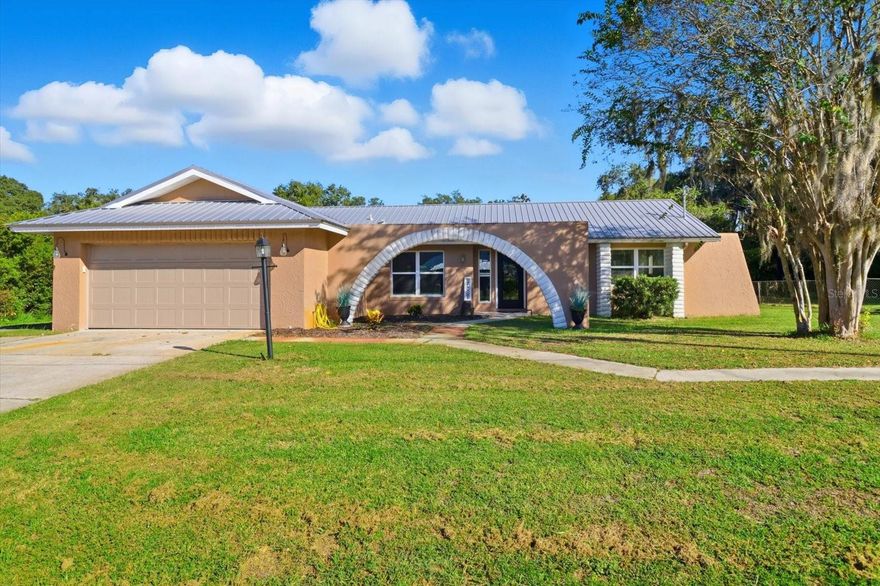 Welcome home! This beautifully renovated 3-bedroom, 2-bathroom home features a 2-car garage and an open floor plan that seamlessly combines the living room, dining room, and kitchen, making it perfect for entertaining. Located just off Gospel Island, this property offers a highly advantageous position, mere minutes from Downtown Inverness and a short drive to I-75. Prepare to be impressed as you step inside this modern-style home. Follow the path through the archway to discover a spacious interior boasting stunning waterproof laminate flooring, elegant wood cabinets, and all newer appliances. You'll also appreciate the convenience of an indoor laundry area, abundant natural light, ample storage space, and many other thoughtful features. This home truly shines with its meticulous attention to detail. Situated on a half-acre lot, the property provides ample space for future enhancements such as a deck, outdoor kitchen, or a large workshop/garage.