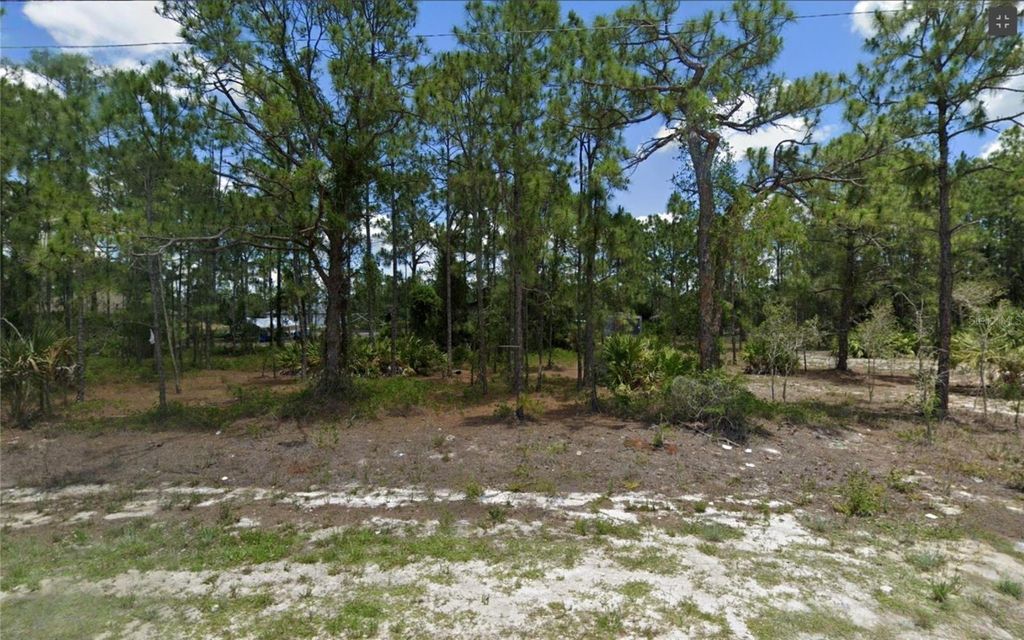 Photo of 715 Alamo Street E, Lehigh Acres, FL 33974 (MLS # TB8459502)