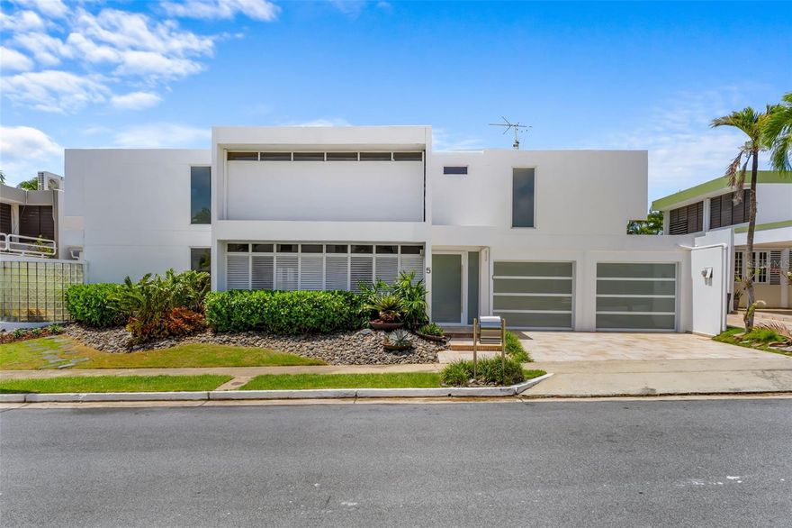 Located in the exclusive Alturas de San Patricio community, within the gated neighborhood of Caparra Hills and a second, more private access with only 14 residences, this distinguished two-level home offers privacy and comfort in a prime location. The property features 4 bedrooms, 2.5 bathrooms, a double garage with electric doors, and a spacious terrace ideal for entertaining, complete with an outdoor concrete bar. It also boasts a fully renovated pool for your enjoyment. The rental includes appliances such as a refrigerator, stove, microwave oven, washer, and dryer. Air conditioning is available in all bedrooms and the living room, and the home is equipped with a gas-powered generator. Conveniently located near Avenida San Patricio, you'll have easy access to shopping centers, banks, restaurants, private schools and main roads. An exceptional option for those seeking comfort, security, and a highly desirable location in Guaynabo.