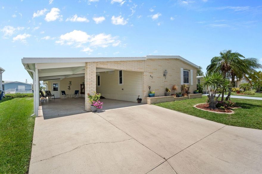 LARGE PRICE ADJUSTMENT! A very unique find within the 55+ GULF ACCESS community of Harbor Cove! This FURNISHED 2 bedroom, 2 bathroom, CANAL FRONT home with DOCK has approx. 1420 sq. ft., including an enclosed 220 sq. ft. Florida room with beautiful water views! Outside the brick front, extra large carport, plus attractive landscaping set the stage for what’s to follow. This well maintained residence in the PET SECTION is nicely updated and has a welcoming coastal vibe and décor. The kitchen has plenty of cabinetry and counter space, a breakfast bar, closet pantry, stainless steel appliances, an opening to the living room and a dining room with built in hutch nearby. Decide between dining and entertaining friends with stunning sunset views from the Florida room, the covered and screened lanai, or the waterfront patio. The large living room is nice and bright with plenty of windows and sliding doors direct to the Florida room. The impressive and spacious primary suite has a large walk-in closet and a remodeled ensuite bathroom with attractive cabinetry and tiled shower. The updated hall bathroom is handy for visitors staying in the well-appointed guest room with dual closets. You'll find lots of storage space in the attached shed with laundry area. Many recent UPDATES including new roof, vapor barrier, luxury vinyl flooring, and re-plumb (2025), hot water heater and washer and dryer (2024), A/C system and appliances (2022), plus impact windows and more. HOA fees of only $150 per month cover seawall maintenance, mowing and access to two swimming pools, hot tub, fitness center, sports courts and a 17,000 sq. ft. clubhouse overlooking the picturesque marina. Join the boat club and make friends at dances, holiday events, trivia, card games, golf cart parades and other organized events. Boating and fishing fans can just jump in their boat in the backyard and go explore the majestic Myakka River all the way to the Gulf. Nearby are restaurants, golf courses, spring training baseball stadiums, farmers markets, quality healthcare and several area beaches. Schedule a showing today to view this lovely property!