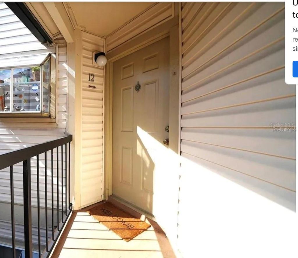 Photo of 1908 Lake Atriums Circle #12, Orlando, FL 32839 (MLS # S5141163)