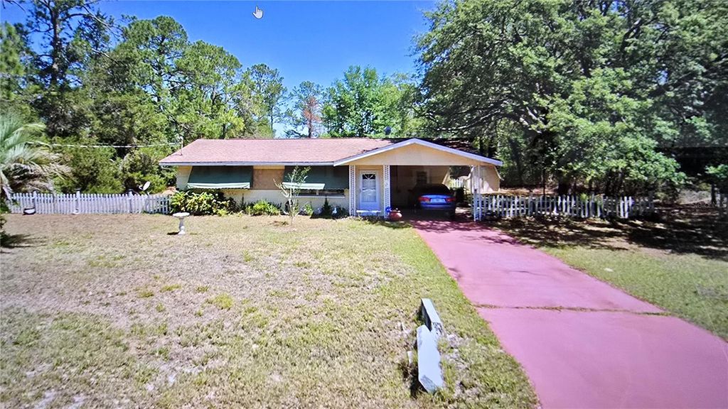 Photo of 20851 SW Audubon Avenue, Dunnellon, FL 34431 (MLS # OM723664)
