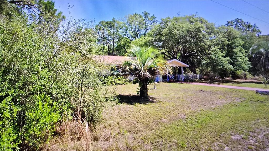 Photo of 20851 SW Audubon Avenue, Dunnellon, FL 34431 (MLS # OM723664)