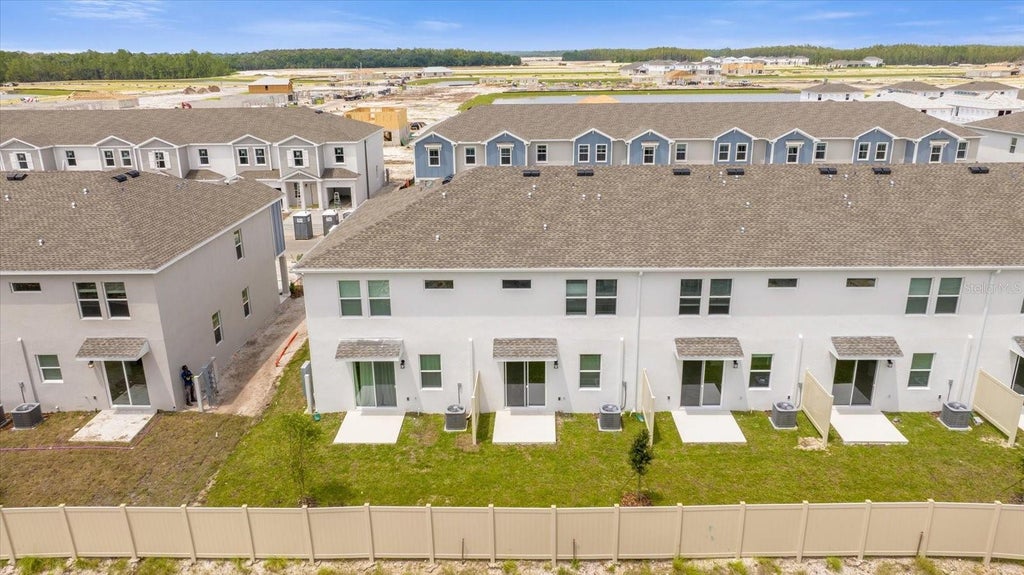 Photo of 2474 Skyline Loop, Kissimmee, FL 34758 (MLS # O6450586)