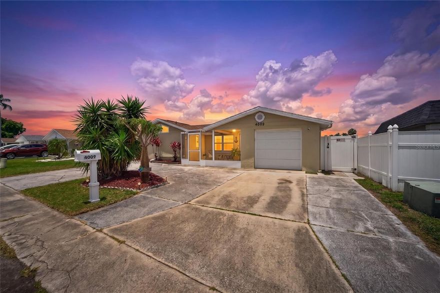 WATERFRONT POOL HOME WITH STUNNING CANAL VIEWS, PRIVATE DOCK, SCREENED POOL & NO HOA! Too many upgrades and features to list!  HAS NEVER FLOODED.  Most of neighborhood never got water inside homes either during any storm.  Welcome to your slice of Florida paradise in the heart of Holiday! This beautifully updated 2 bedroom, 2 bathroom waterfront home sits directly on a wide canal off Lake Conley and delivers the kind of backyard views buyers dream about. From the moment you step thru the front door, you’ll love the curb appeal, oversized driveway, tropical landscaping, and laid-back waterfront lifestyle this property offers. Step inside to an open and inviting layout filled with natural light and beautiful water views throughout the main living spaces. NEW LUXURY VINYL PLANK FLOORING (2022) flows seamlessly throughout the home, creating a clean and modern feel. The spacious living and dining areas open directly into the oversized Florida room where large sliding glass doors perfectly frame the pool and canal views, making this home ideal for entertaining or simply relaxing after a long day. The kitchen has been updated with a breakfast bar, matching appliances, abundant cabinet space, and a beautiful glass tile backsplash that adds the perfect finishing touch. The primary suite offers a private en-suite bathroom with a walk-in shower, vanity with makeup area, and oversized closets, plus the added bonus of a dedicated second water heater serving the primary bathroom. There are even CUSTOM BUILT IN CABINETS that house the washer/dryer!  Step outside and enjoy true Florida waterfront living! The SCREENED-IN POOL AREA is perfect for year-round enjoyment with plenty of room to lounge, entertain, and soak in the peaceful water views. The POOL WAS REFINISHED (2018), POOL PUMP REPLACED (2020), and SCREEN ENCLOSURE RESCREENED (2021). The fully fenced backyard leads directly to your PRIVATE WATERFRONT DECK where you can enjoy morning coffee, evening sunsets, fishing, kayaking, or simply watching the water from your own backyard. Major updates include NEWER SHINGLE ROOF (2018), NEW HVAC (2019), DOUBLE PANE WINDOWS, NEW SEWER LINE (2023), and solar tint added to the rear windows and doors for improved energy efficiency. The 1-car garage, oversized outdoor entertaining areas, and NO HOA OR CDD make this property even more appealing. Conveniently located near Tarpon Springs, the famous Sponge Docks, Gulf beaches, parks, shopping, dining, hospitals, Tampa International Airport, and the Pinellas Trail. Florida waterfront living doesn’t get much better than this. Schedule your showing TODAY!