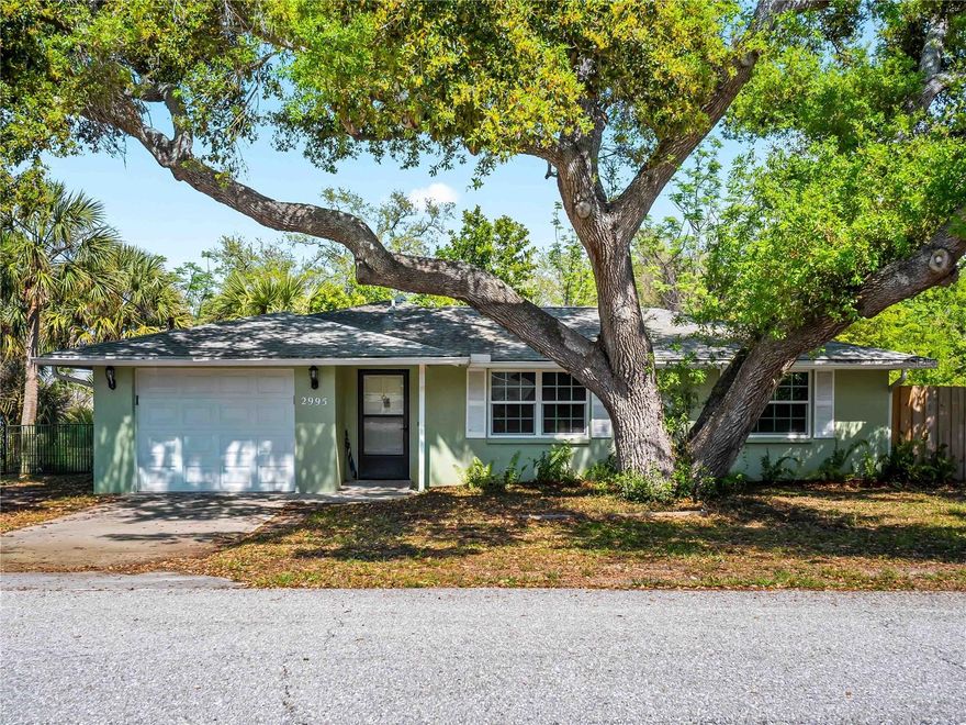 Great location in South Venice, central to everything.  Take advantage of the ferry to the South Venice beach or the South Venice Boat ramp.
As you pull up to this home you will be greeted by the huge mature oak tree the shades the front yard and the front of the home.  Backyard is fenced for privacy, pets and little ones. Inside the home has been freshly painted.  The kitchen has been updated with newer cabinets and granite countertops.  All windows are Impact windows. There is a screened porch for those many beautiful outdoor days.  Could you use a in home Salon? Half of the garage is air conditioned and includes the washer/dryer, salon chair and sink.  The garage door is still functioning with half the garage as a workshop or storage.  Easy to show and purchase!