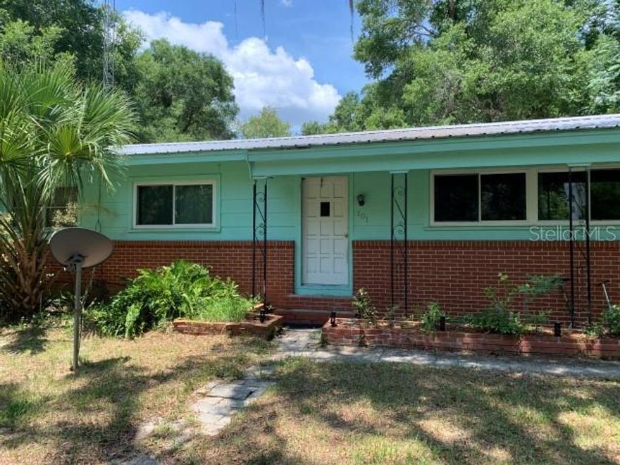 Available February 2026, A spacious 3 bedroom 2 bathroom home fully fenced in on 1 acre located just 10 minutes from Melrose and 20 minutes from the heart of Gainesville. This home has original pine wood floors, with a Florida sun room, an attached carport, garage, and porch. Dogs allowed ( no aggressive breeds) with a nonrefundable pet deposit of $250.00. No Smoking.
