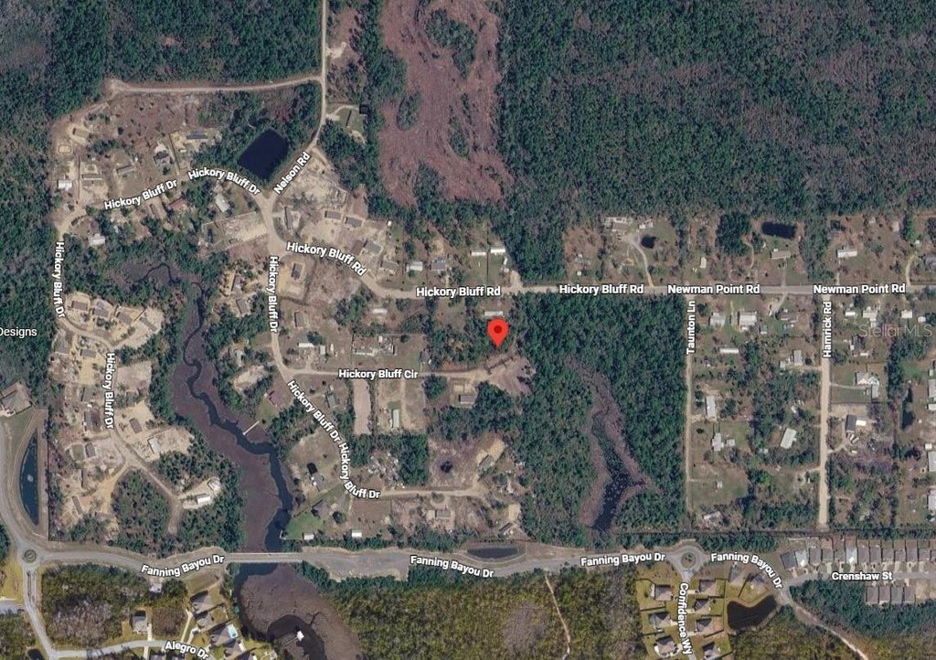Photo of 421 Hickory Bluff Circle, Southport, FL 32409 (MLS # K4903703)