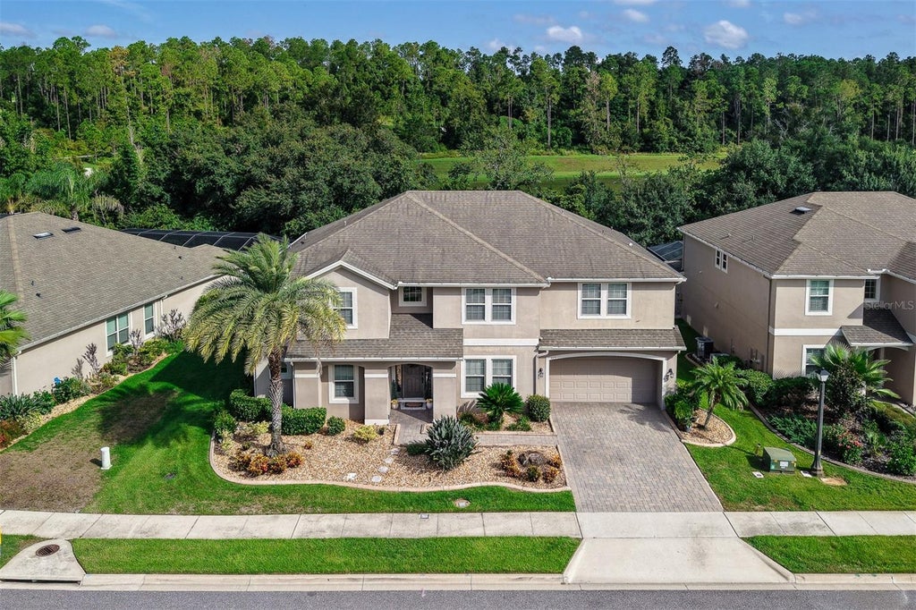 Photo of 623 Timbervale Trail, Clermont, FL 34715 (MLS # O6440417)