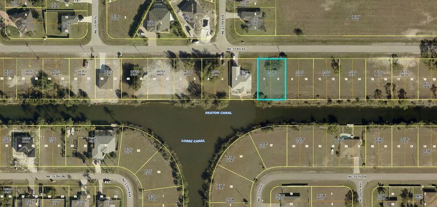 Southern exposure lot with intersecting canal views! Are you in search of the ideal location to build your dream home in Southwest Florida? Look no further! This exceptional lot is located in a rapidly developing area, offering a vibrant community atmosphere. You will be surrounded by an array of outstanding restaurants, golf courses, bowling alleys, and excellent shopping centers. Don’t miss this opportunity to invest in your future—act quickly and take the first step toward living your best life!