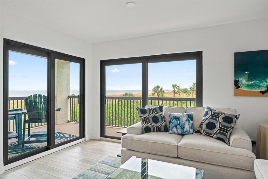 BEACH FRONT 3/2 condo located on the HGH AND DRY SECOND FLOOR in highly sought after Pass-a-Grille only 1 block from the iconic Don Cesar Hotel! This condo has been totally remodeled recently from top to bottom: brand new kitchen cabinetry, new quartz countertops, all new appliances, both bathrooms have been totally redone with gorgeous porcelain tile, new doors, and all new "wood" flooring throughout the entire unit. The views of the turquoise waters of the Gulf of Mexico and the "Pink Palace" from the huge wrap around balcony are magnificent. Walk to the Don Cesar or bike to historic 8th Ave in Pass-a-Grille to enjoy the many restaurants, bars, and quaint shops or you're only a 12 minute Uber ride to bustling Downtown St Petersburg. This is beach life at its best!
