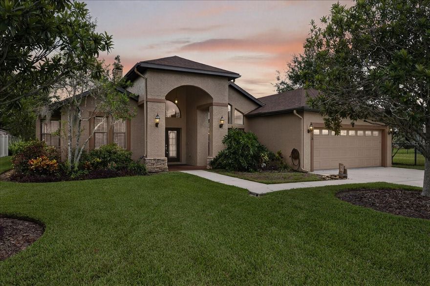 One or more photo(s) has been virtually staged. Welcome to your dream spring fed lakefront retreat! This beautifully newly remodeled home offers stunning water views and a thoughtfully designed open-concept layout, perfect for both entertaining and everyday living. Step inside to find a bright and airy floor plan featuring modern finishes, upgraded flooring, and a seamless flow from the spacious living room to the gourmet kitchen and dining area with a clear view of the water.

The split-bedroom design provides privacy and comfort, with a luxurious owner’s suite on one side of the home and guest bedrooms on the other. Large windows and fully sliding glass doors frame the lake, filling the home with natural light and creating a serene atmosphere.

Enjoy a relaxing morning on the Trex dock for coffee and breathtaking sunsets from your private backyard oasis that has a small private beach with direct lake access for fishing, kayaking, or simply unwinding by the water.

This move-in ready lakefront gem comes with TONS of upgrades (new floors, paint, 5 inch baseboards, 2024 roof). Your new home combines style, function, and tranquility—an opportunity you won’t want to miss!