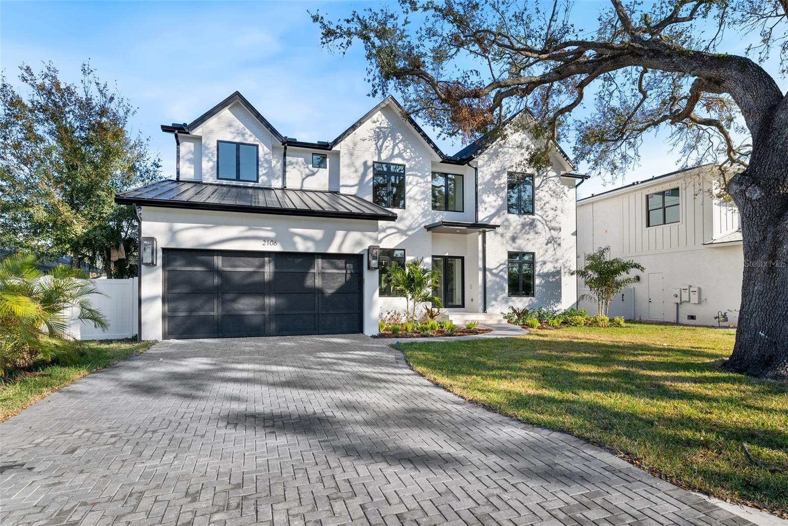 Imagine being able to walk your children to school like in the old days ! Mabry Elementary, Coleman Middle School, as well as St. Mary's Episcopal are all around the corner (5-10 min) Also, Little League is in the same neighborhood! This is a New elegant Transitional home developed by Baywalk Custom Homes. Enter through the light and bright 2-story foyer. The first floor
features a gourmet kitchen with a large island and large HIDDEN walk-in pantry, Thermador stainless steel appliances, including 48" built-in fridge, 18" full-size wine cooler, &
range w/double oven, marble countertops, and adjacent spacious Breakfast area. Dry bar with wine fridge adjacent to a formal dining room. The kitchen opens to the family
room featuring a gas fireplace, and large French glass doors lead to the spacious lanai. In addition, this floor features a downstairs bedroom suite with a full bath, a great
office/den and a separate powder room. Functional mudroom as you enter from a 4 car tandem garage! The second level of this home boasts a lavish master suite complete
with a large master bath, including a free-standing bathtub, shower with rain-head and a very generous walk-in closet. The three remaining bedrooms are all suites with walk-in
closets. This level is also home to a large Laundry room, as well as a large bonus room with adjacent 1/2 bath.. Back on the ground floor, French glass doors lead to outdoor
living space on the covered lanai with tongue & groove ceiling, outdoor kitchen w/ gas grill, professional hood, under-mount stainless sink, 24" beverage fridge, and it is
overlooking the pool and spa with an extra deep lot ( 137 ft ) with great additional yard space. Additional features include engineered hardwood floors in all dry areas, a deep 4
car tandem garage, Jeldwen Impact Low-E insulated windows, 8' solid core doors, pre-wiring for Smart Home Technology, & a fully landscaped yard.