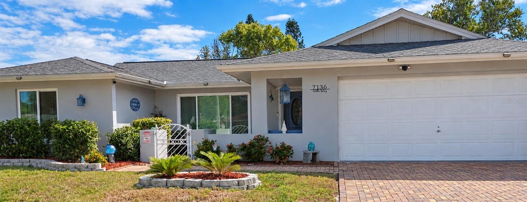 Photo of 7136 Vista Way, Port Richey, FL 34668 (MLS # W7890068)