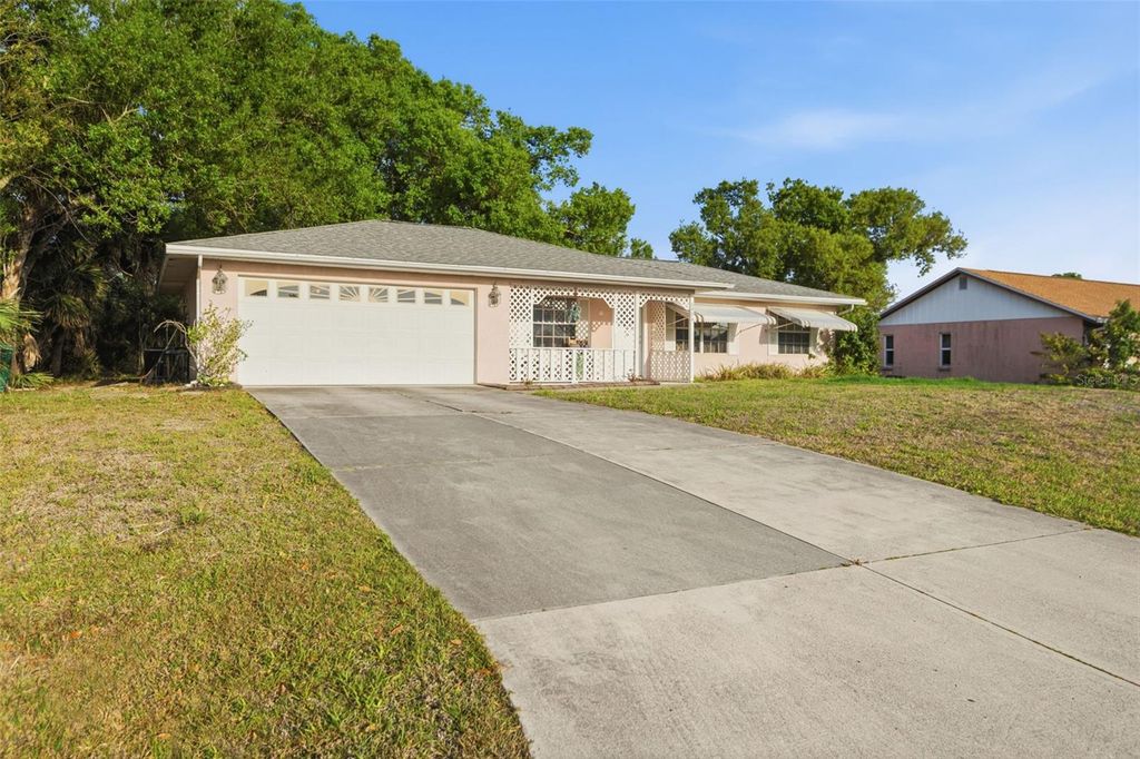 Photo of 6924 Tuxedo Street, Englewood, FL 34224 (MLS # TB8489535)