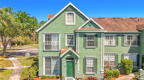 Photo of 9068 Lake Chase Island Way #9068, Tampa, FL 33626 (MLS # TB8477176)