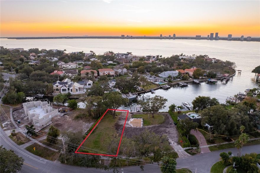 Build your dream waterfront estate on this almost a third of an acre homesite on Davis Islands, offering direct access to Tampa Bay with no bridges to navigate. This oversized lot features approximately 75 feet of street frontage on picturesque Blanca Avenue by 185 feet of depth. This waterfront lot is on a wide, navigable canal—ideal for boating enthusiasts. The lot is mostly cleared and offers an expansive canvas for a custom home that captures the best of waterfront living. Located in one of South Tampa’s most desirable neighborhoods, Davis Islands offers an unmatched lifestyle with top-rated schools, charming local shops and restaurants, scenic trails, and golf cart-friendly streets. Enjoy proximity to Tampa General Hospital, Peter O. Knight Airport, a public marina, parks, tennis courts, a beach, and vibrant downtown destinations like Water Street, Sparkman Wharf, and the Tampa Riverwalk. Whether you’re looking to create a luxurious private retreat or a showstopping modern estate, this rare opportunity combines location, water access, and lot size in a way few properties can.