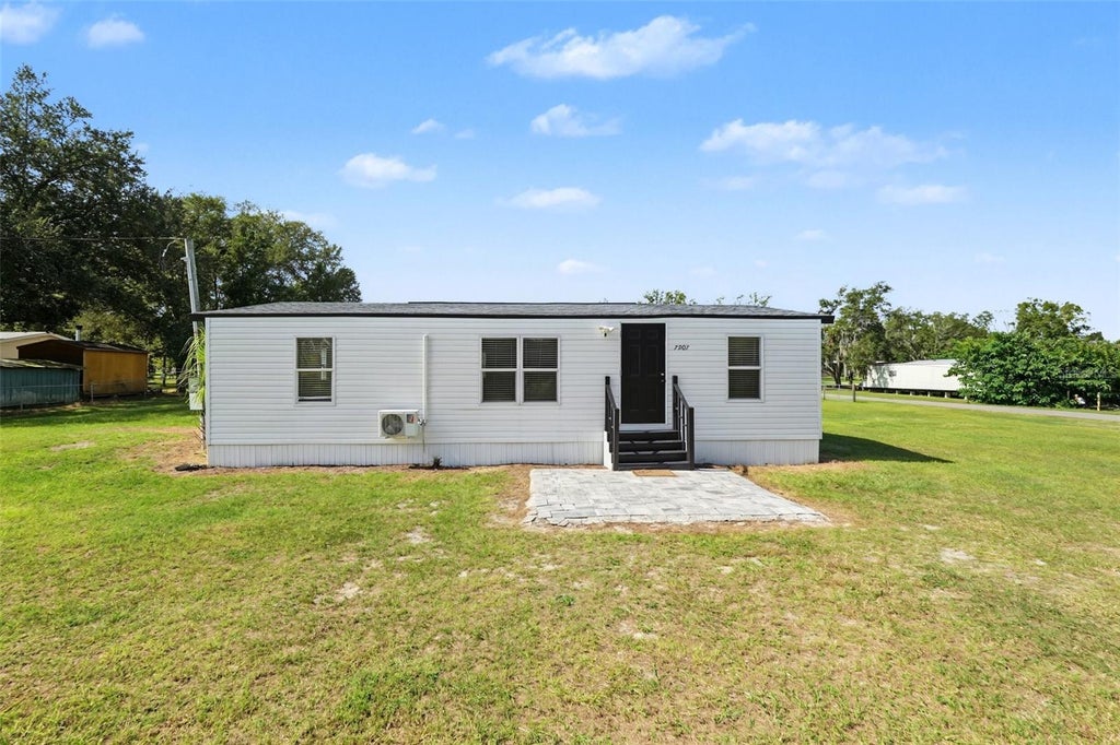 Photo of 7907 Dowd Drive, Wesley Chapel, FL 33544 (MLS # TB8562424)